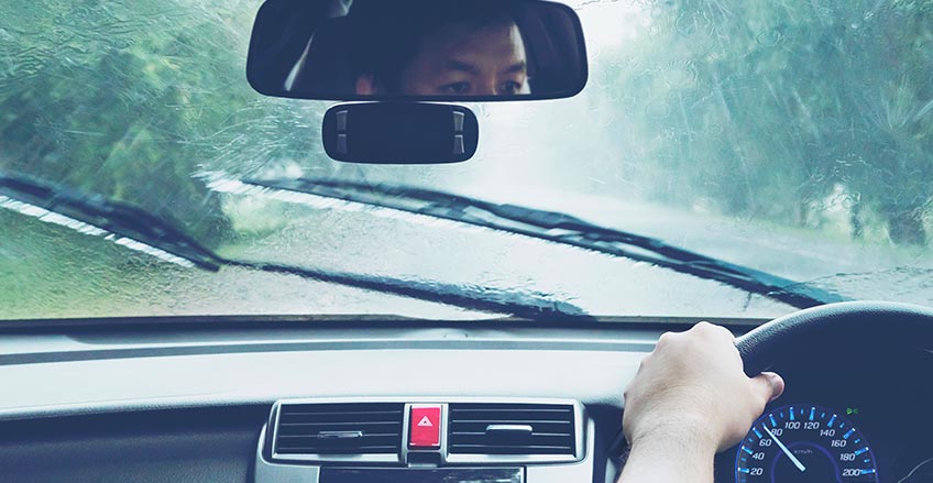 Replacing windshield wiper blades for better visibility during Vancouver's rainy season